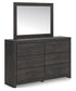 Hollivern King Panel Bed with Mirrored Dresser, Chest and Nightstand