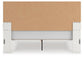Zuraleus King Upholstered Panel Platform Bed, Dresser, Mirror, Chest and Nightstand